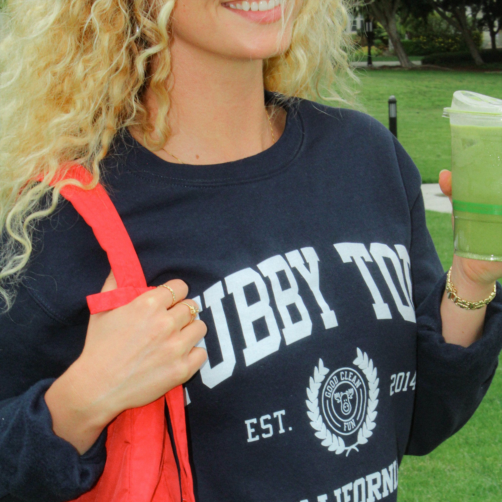Women wearing the new TT Sweatshirt.